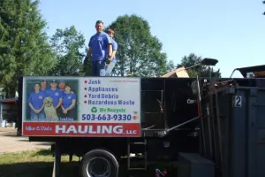 Mike & Dad's Hauling team loading truck. Contact Mike & Dad's Hauling for your junk removal needs in Vancouver, Portland, and Salem.